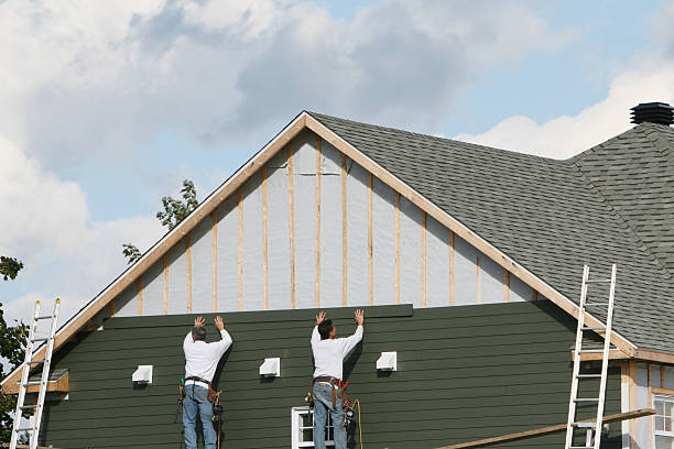 Professional Siding Repair technician working in Chester, MD